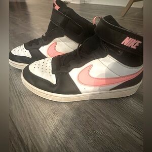 Girls Nike size 1.5 black and pink high tops.